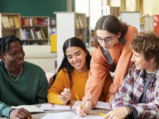 high school students working together on a project