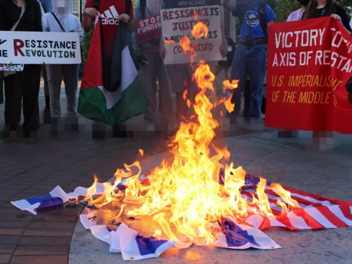 Photo: Anti-Israel protesters at Purdue University in West Lafayette, Indiana, burn Israeli and American flags and display signs and banners celebrating terror on the third anniversary of the Hamas-led October 7, 2023, terror attack on Israel. (Source: Screenshot/Instagram) 